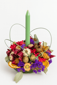 Floral table arrangement with candle